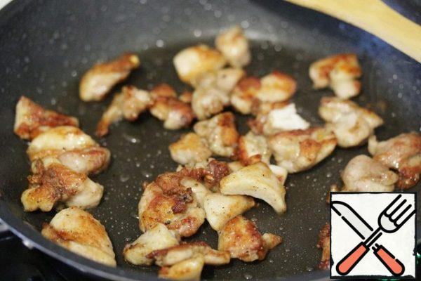 Stir-fry the chicken until tender.