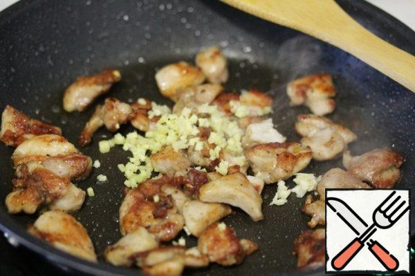 Add the chopped garlic and ginger to the pan and fry all together for 30 seconds.
It will smell crazy delicious!