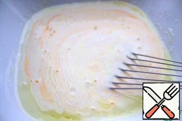 Beat lightly with a fork or whisk.