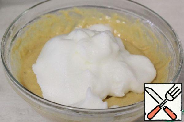 Add the whites to the bowl with the dough.
