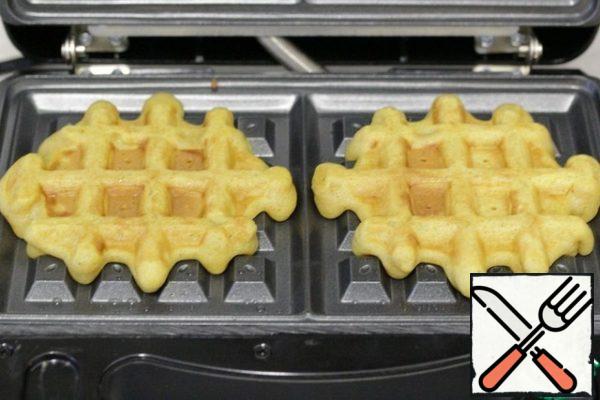 Bake the waffles until tender.
