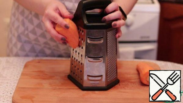 Grate the carrots.