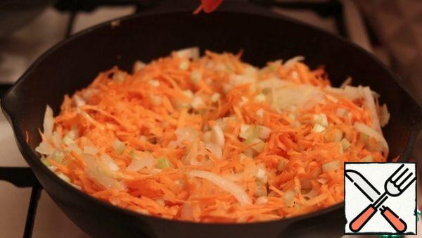 Next, we send carrots and celery to the onion to fry.