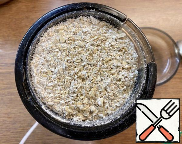 Grind the oat in a coffee grinder/blender to a flour state.
It is better to take oat flakes that need to be cooked for 10-15 minutes.