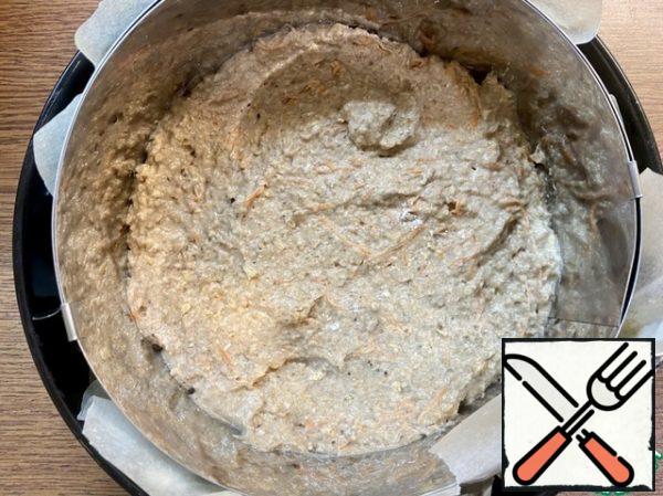 In a baking dish with removable sides, put parchment and put the dough.
You can use a cooking ring (put in a baking dish/on a baking sheet).