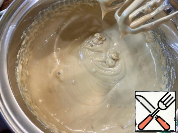 Add sour cream and beat until smooth (like thick sour cream). The cream should not become too liquid.