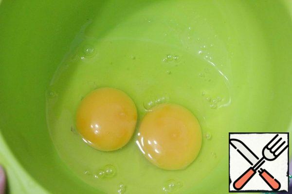 In another bowl, beat the eggs.