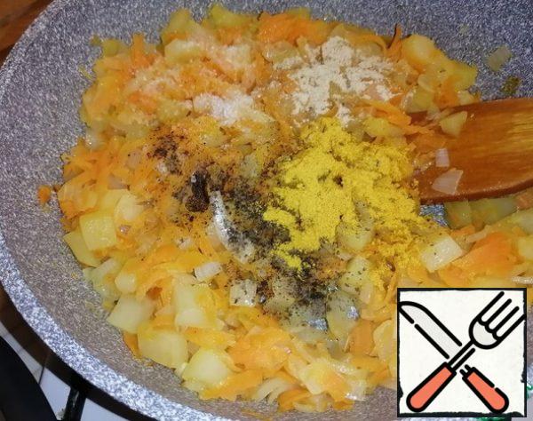 Add ginger and turmeric. Add salt and pepper to taste.
