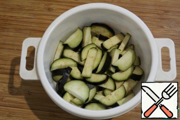 Cut the eggplant and put it in the microwave for 5 minutes or cut it and boil it slightly.