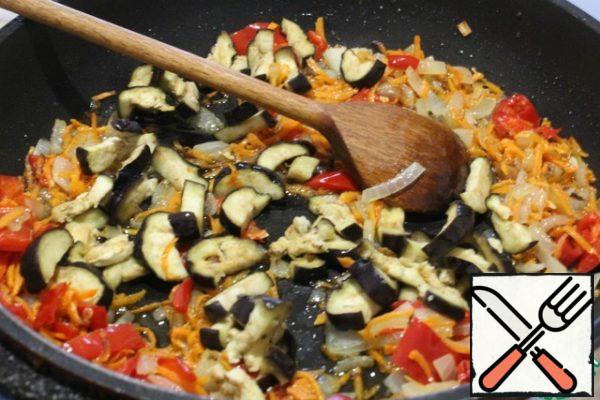 Add the eggplant and fry.
