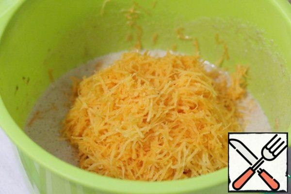 Add the grated carrots.