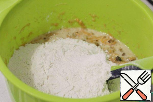 Add the flour mixture and mix quickly.