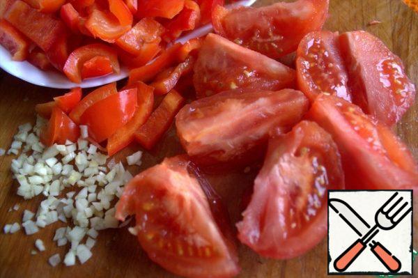 Cut the tomatoes.
