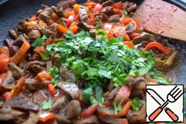 Pour the greens into the ready-made stew.