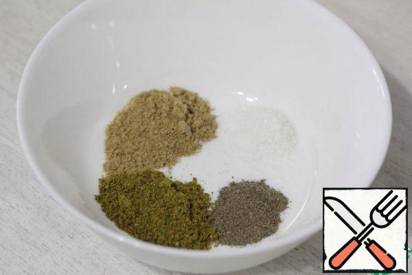 In a small bowl, put the salt, utsho-suneli, hops-suneli and black pepper.
