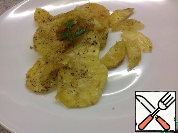 Spread the chips on a plate (if desired, you can dip them in napkins to get rid of excess oil).