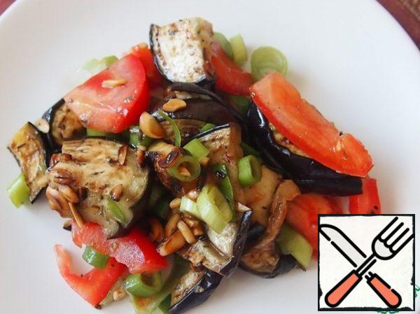 Season the salad with olive oil, add balsamic, salt and pepper. If desired, you can add a couple of Basil leaves and mint to the salad.