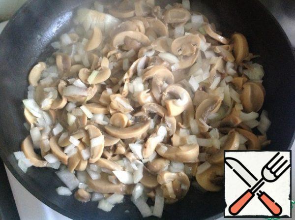 finely chop the onion and fry in a small amount of vegetable oil with mushrooms. cool down.