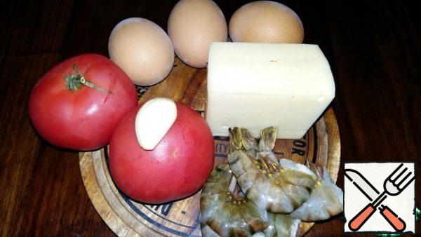 These are our ingredients. Eggs and shrimp should be boiled and cooled. All components of the salad cut into small cubes. Peel the shrimp, leaving only the tails.