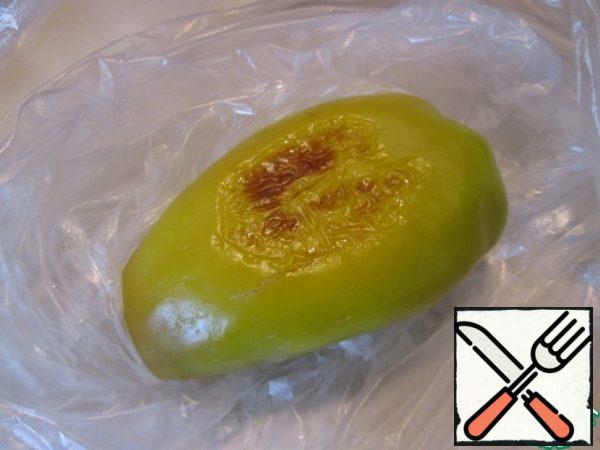 The first step is to prepare the pepper. Preheat the oven to 200 degrees and send the pepper to bake for 10-15 minutes. Then put in a bag and leave for another ten minutes.