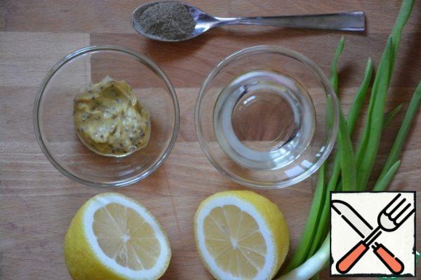 Mix potatoes, herring, and onions in a salad bowl. Add to taste: aromatic vegetable oil, lemon juice, mustard, ground black pepper.