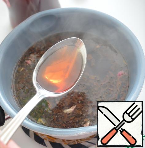 Cover with cold water and put on the stove. Bring to a boil and remove from heat.
Pour dark rum into the grog. add sugar to taste.