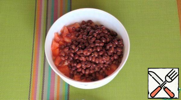 Add the canned beans.