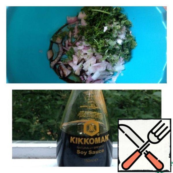 Finely chop the greens as well as the onion. Place in a bowl and add the spices, soy sauce, sugar and vinegar. Mix well.