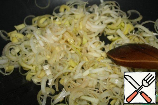 Heat the oil and fry the onion for about 4 minutes.