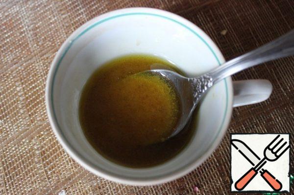 Mix the olive oil, mustard, and vinegar into a smooth emulsion. Dress the salad!