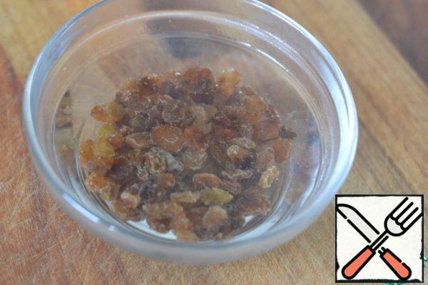 Steam a handful of raisins with boiling water for 5 minutes.