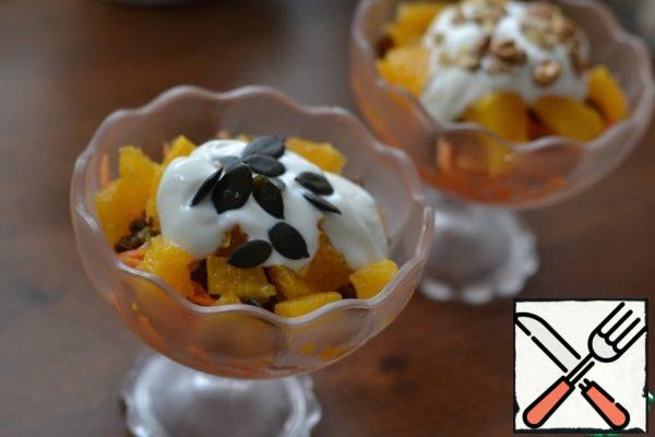 Carefully add cold white yogurt on top.
Top with pumpkin seeds, or add walnuts.