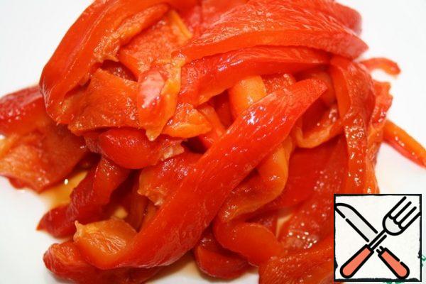 Bake the pepper at temp. 200 deg for about 45 minutes.
Remove the skin, remove the seeds and cut into strips.