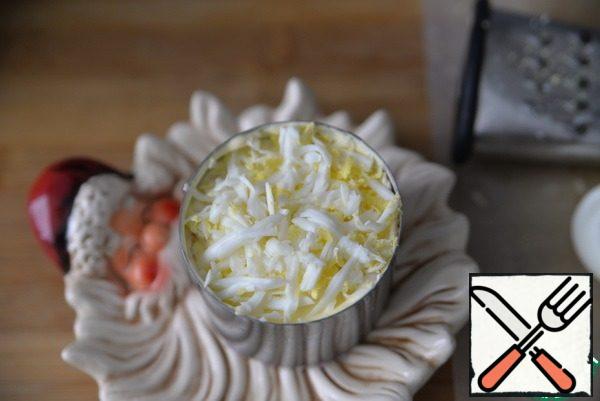 The top layer is rubbed on a grater egg.