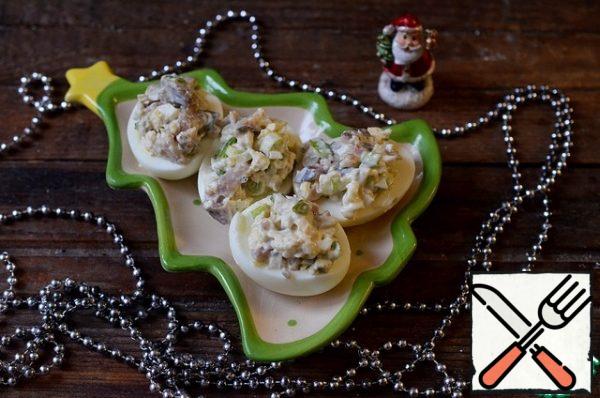 Stuff the egg halves with the resulting filling and serve. Bon Appetit!