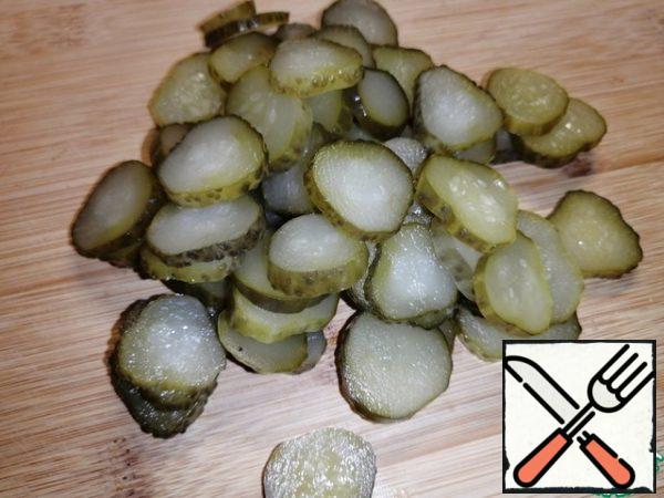 Cucumbers cut as desired-in circles or semi-circles. Pour into a bowl.