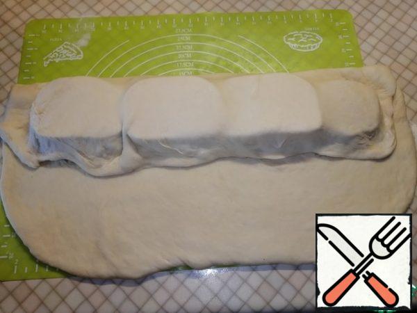 Wrap the edges to the middle, covering our filling.