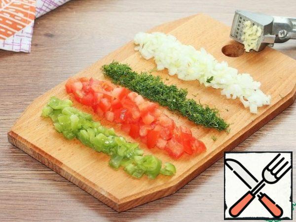 Cut the prepared vegetables and mushrooms into small cubes and finely chop the dill.