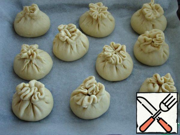 Smear the prepared samsa with egg and put it in a preheated 180* oven for 30 minutes ( use your oven)