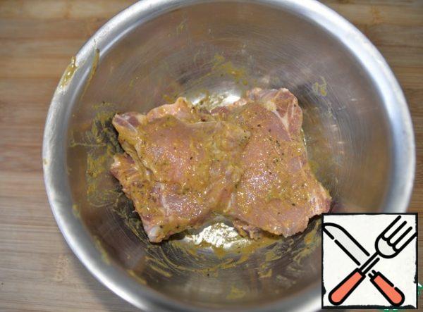 RUB the pieces of pork with marinade, cover and leave to marinate for 1 hour.