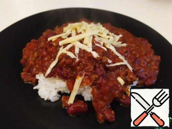 You can serve it with rice, Mexican chips, tortillas. From the top, you can sprinkle with cheese.

Bon appetit.