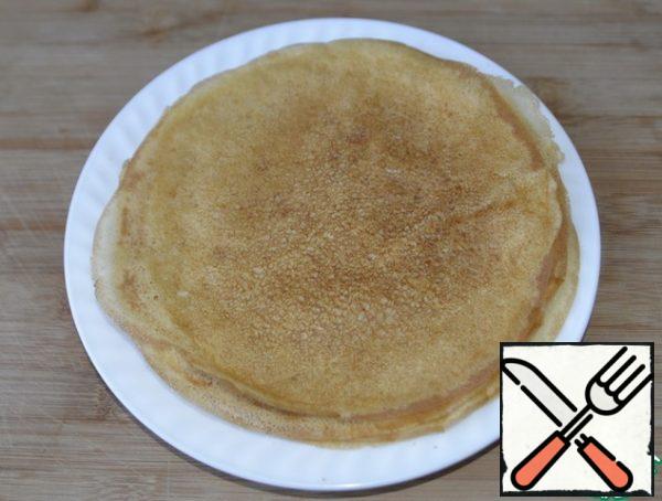 To prepare a snack, you can use any unsweetened pancakes according to your favorite recipe. There are a lot of recipes on the site.
