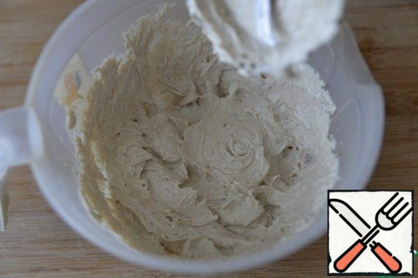 Put the mackerel to the curd cheese, punch it with a blender into a homogeneous air mousse.