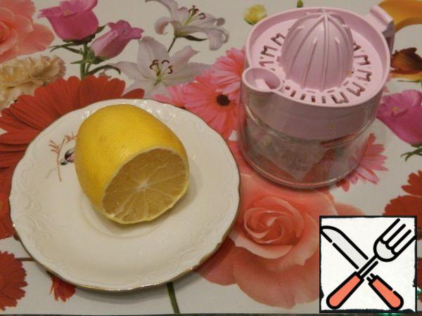 Extract the juice from the lemon.