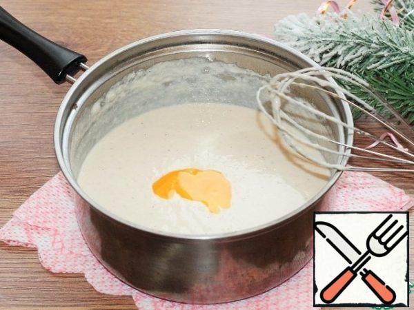 Add the egg yolks and beat thoroughly. Remove the bowl from the heat and cool well.