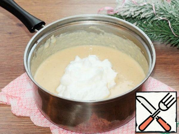 Mix 1/3 of the whites with the meat mixture, then gently stir in the remaining whites.