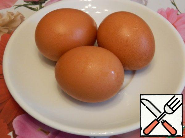 Boil the eggs.