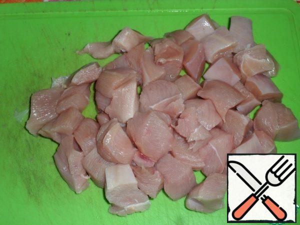 Chicken fillet cut into cubes.