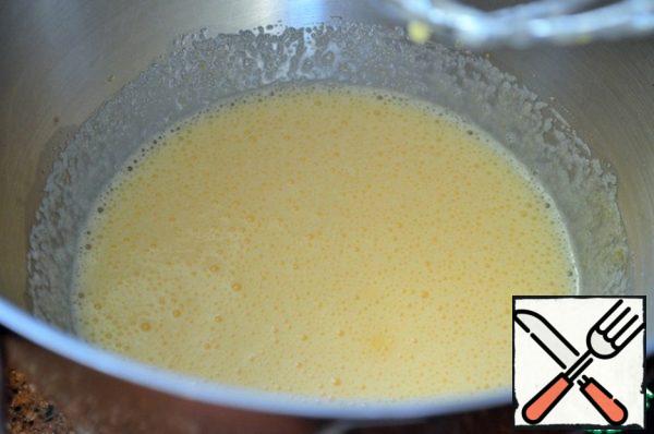 Beat the sugar, eggs and salt until light.