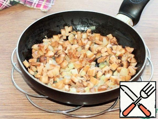Add the mushrooms, salt, pepper and fry for 5 minutes or until half cooked.